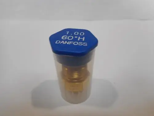 Düse in transparentem Gehäuse, mit einem blauen Deckel. Auf dem Deckel sind Markierungen und der Markenname Danfoss zu erkennen.